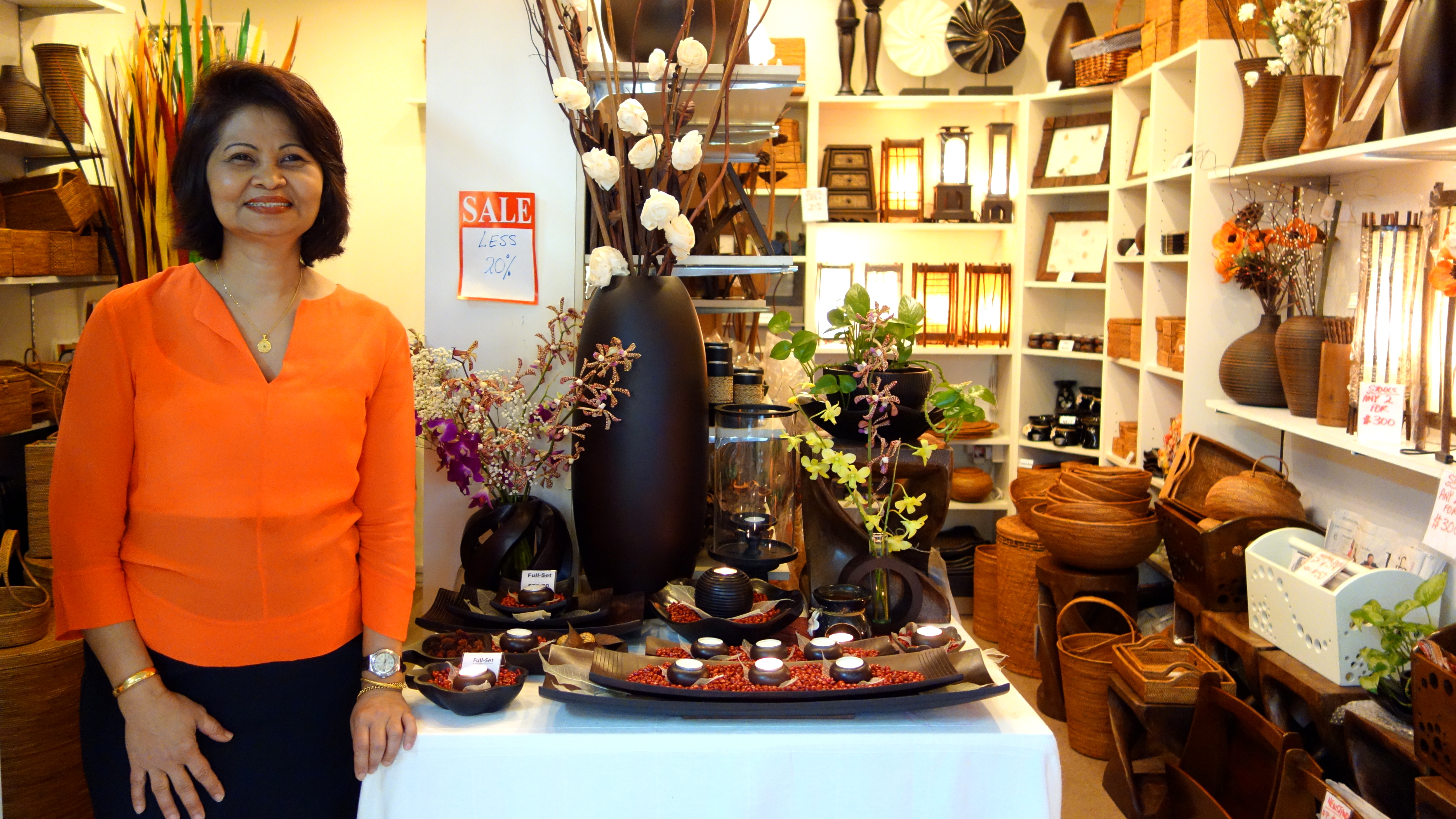 Mango Wood Crafts with home decoration such as handcrafted frames, basklets, and vases at Holland Village in Singapore | Shopkeeper Stories