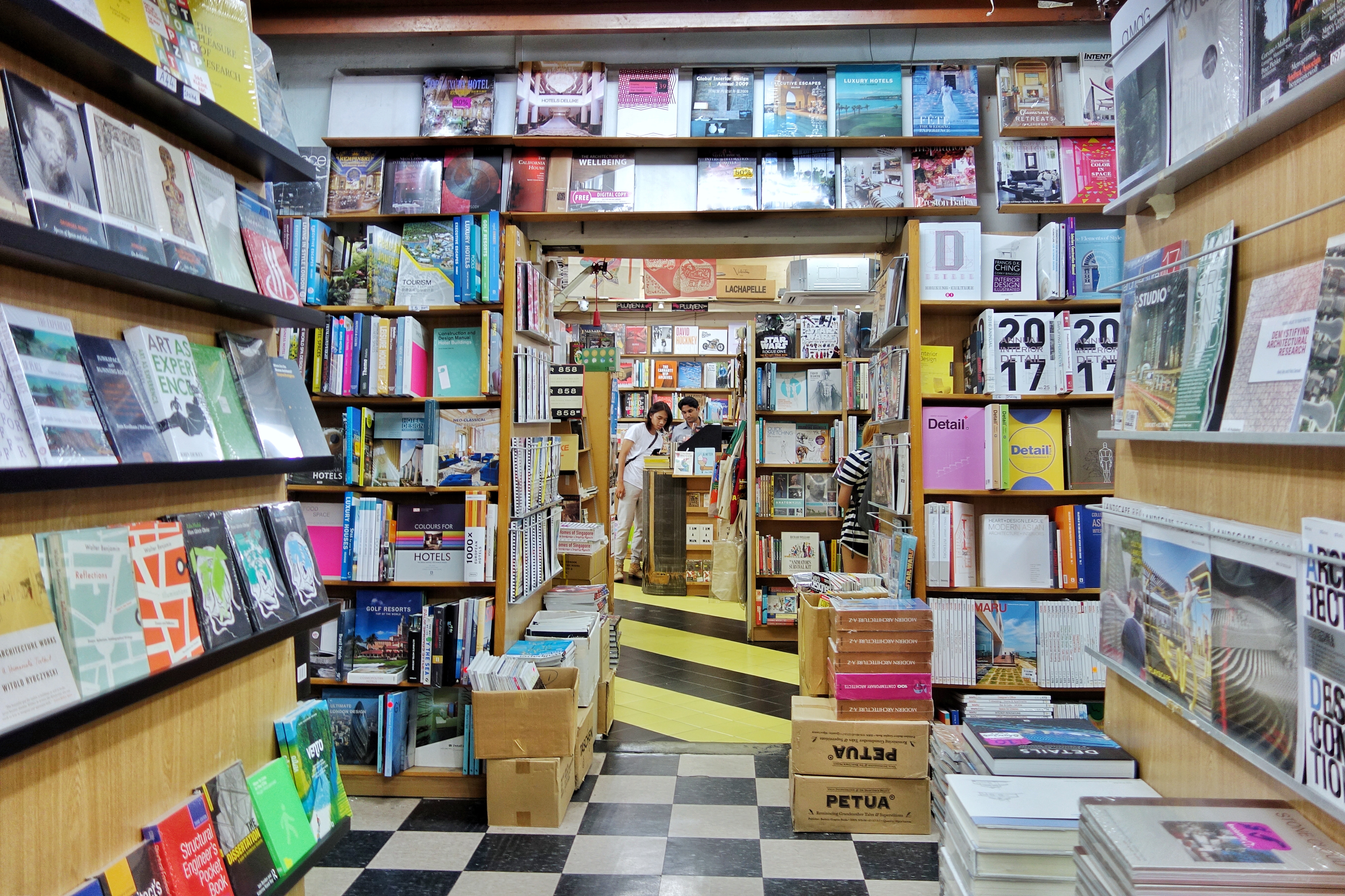 Basheer Graphic Books with the owner Abdul Nasser at Bras Basah Shopping Complex in Singapore - a bookshop series by Shopkeeper Stories | ShopkeeperStories.com