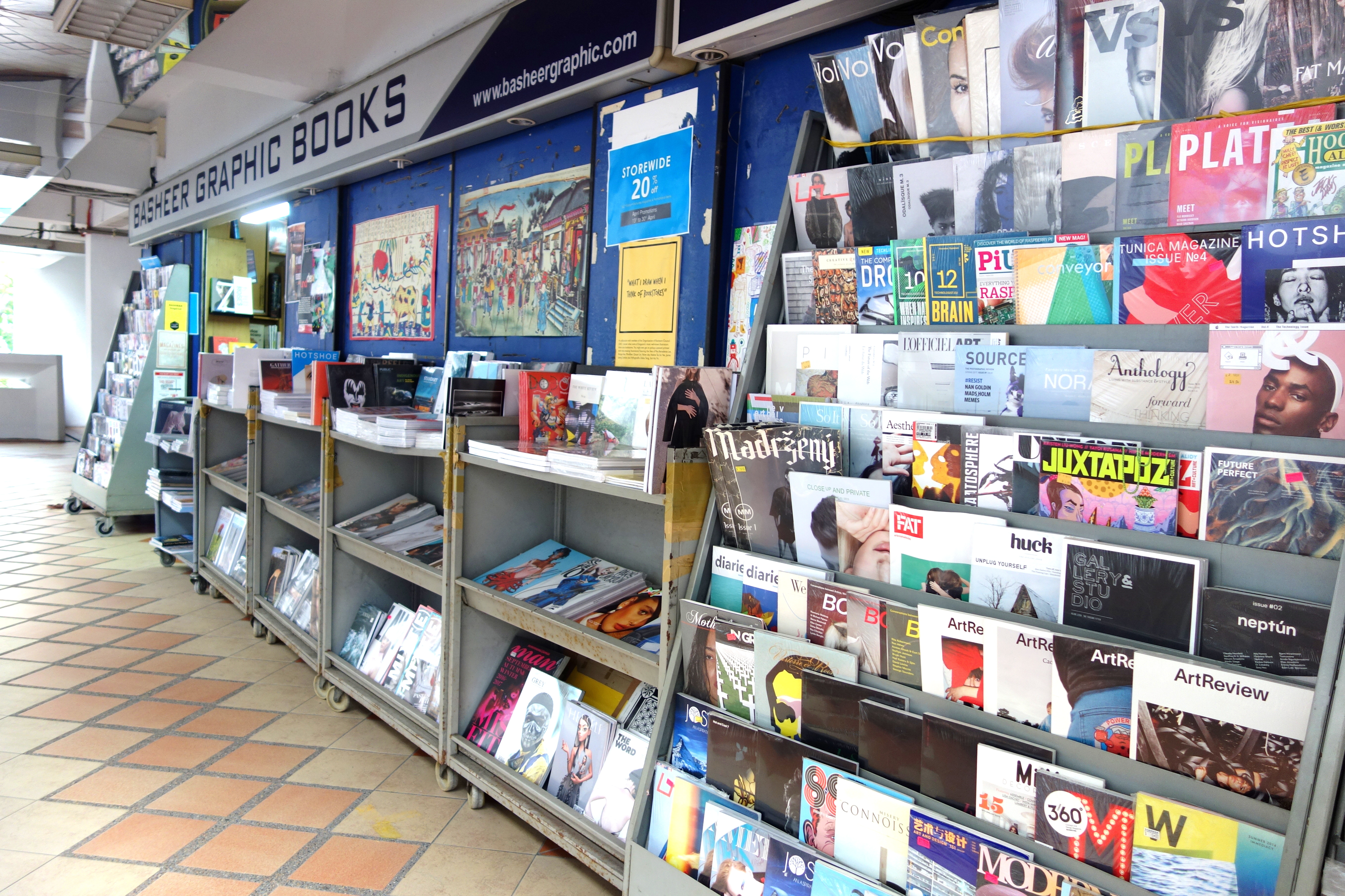 Basheer Graphic Books with the owner Abdul Nasser at Bras Basah Shopping Complex in Singapore - a bookshop series by Shopkeeper Stories | ShopkeeperStories.com